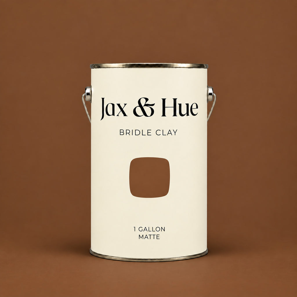 Jax & Hue Bridle Clay one-gallon Signature Matte interior paint can with a deep warm reddish brown color swatch.