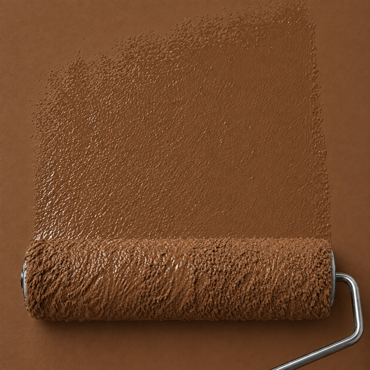 Roller applying Bridle Clay deep earthy brown matte paint to a wall, showing the rich reddish brown color and fresh paint texture.