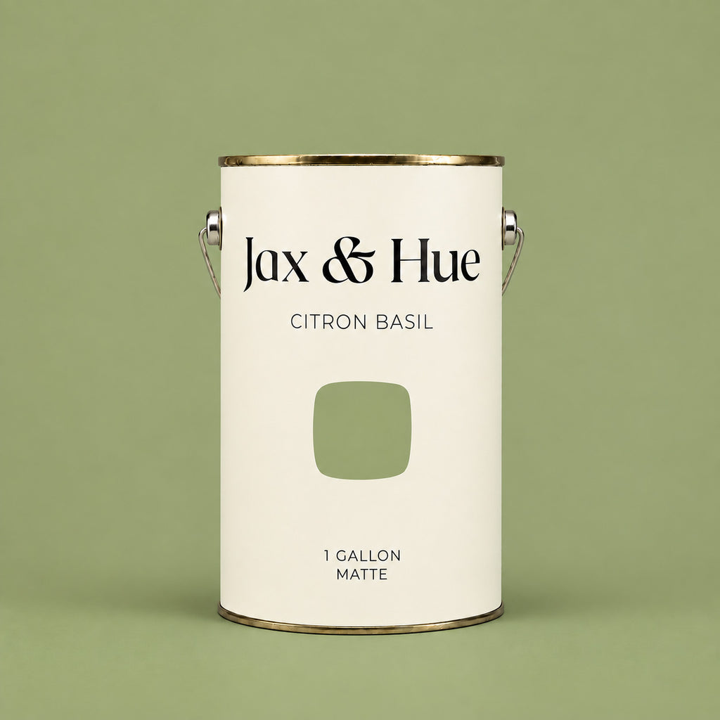 Jax & Hue Citron Basil fresh yellow-green matte paint gallon on a matching green background.