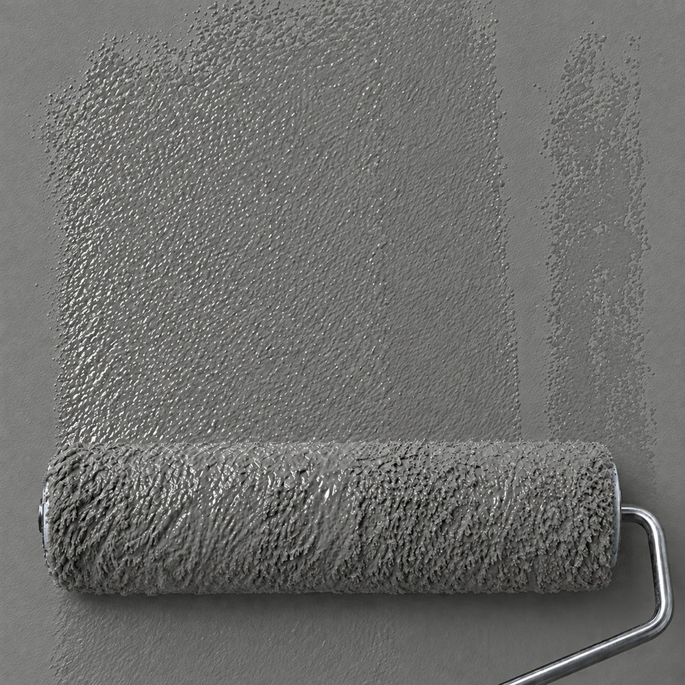 Paint roller spreading Concrete Still neutral medium grey paint across a matching wall.