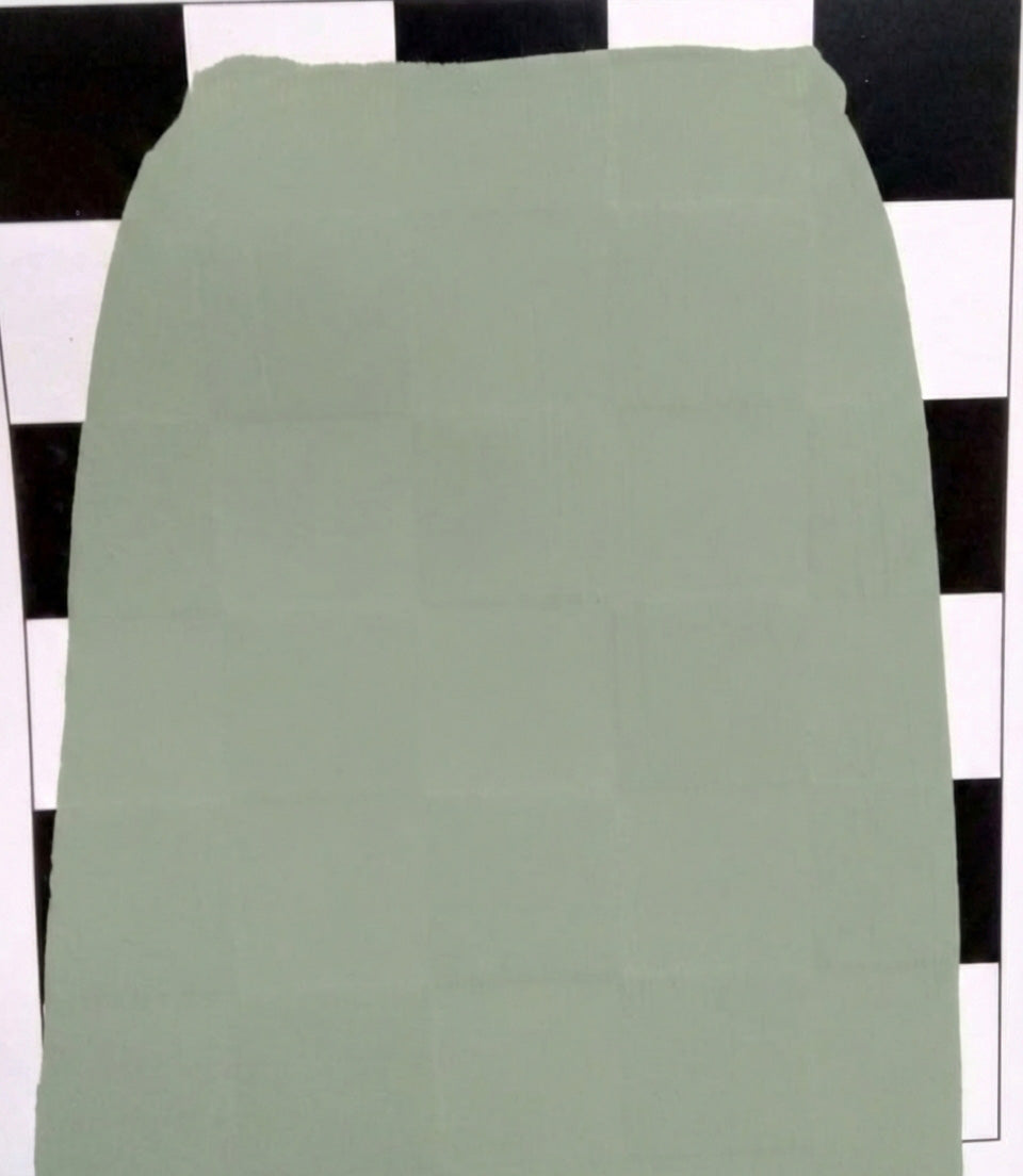 green pigmented paint being tested