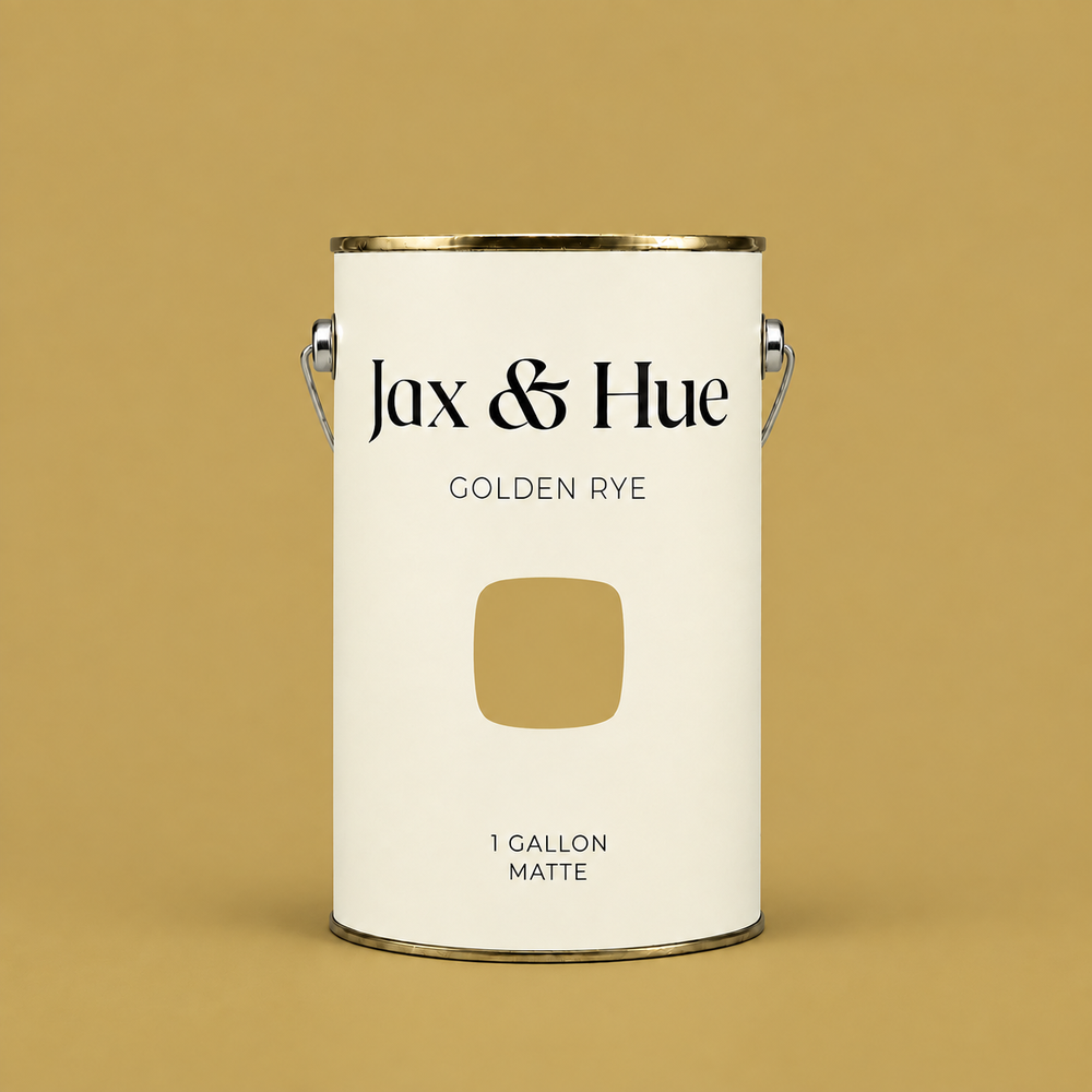 Jax & Hue Golden Rye earthy golden yellow matte paint gallon on a matching yellow background.