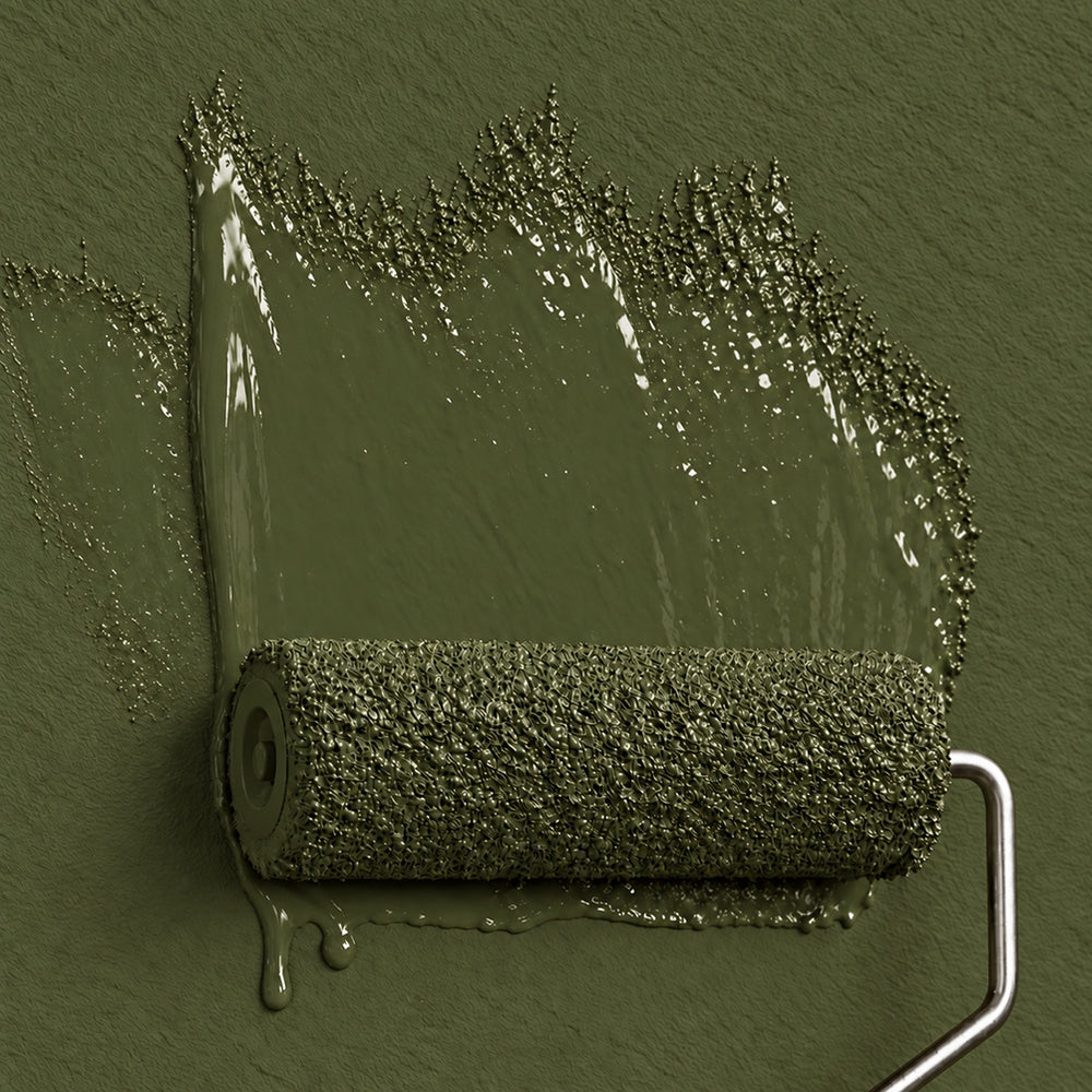 Paint roller coated in Olive Stone muted earthy olive green paint against a matching matte wall.