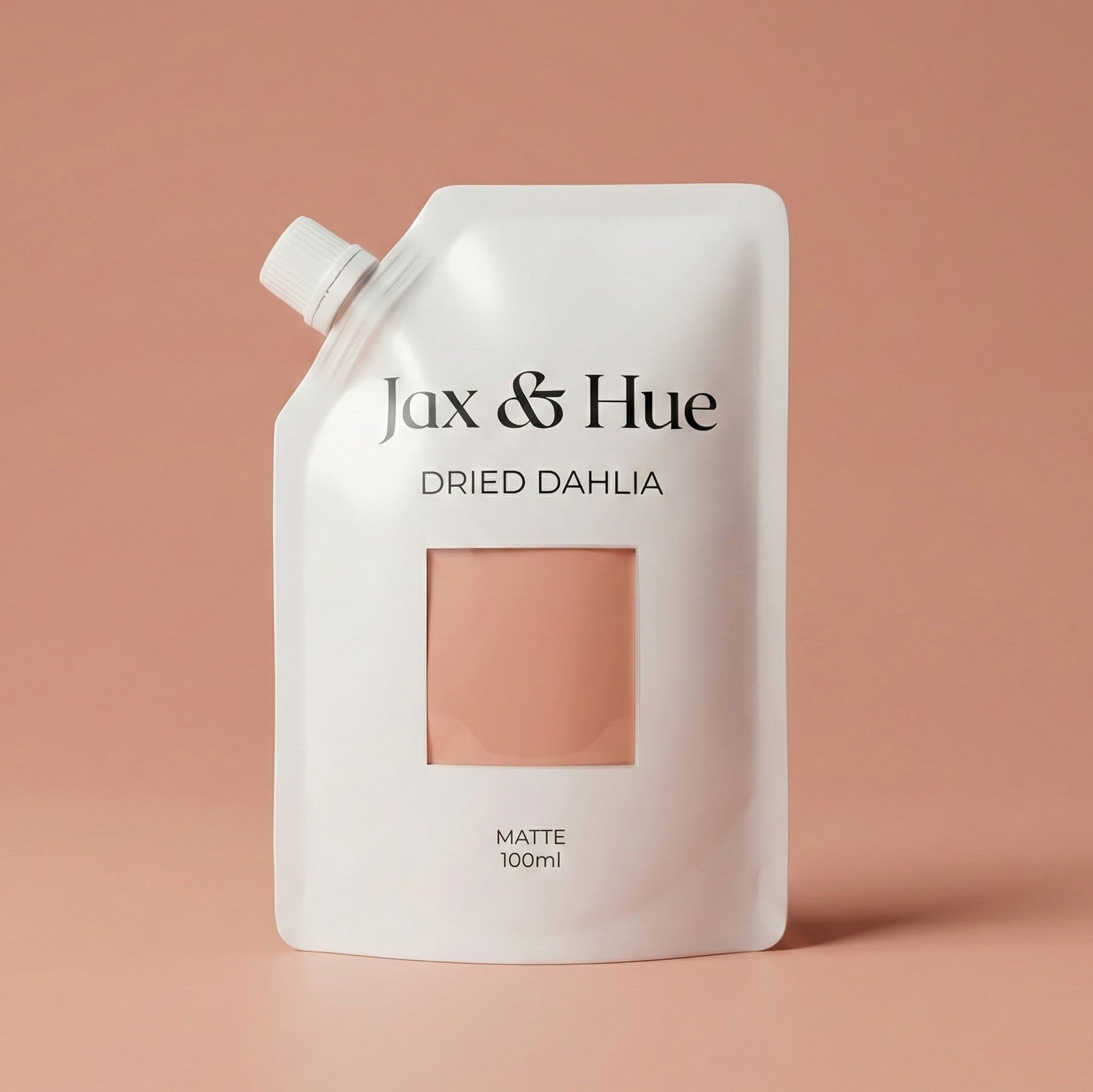 Jax & Hue dried dahlia product packaging on a peach background
