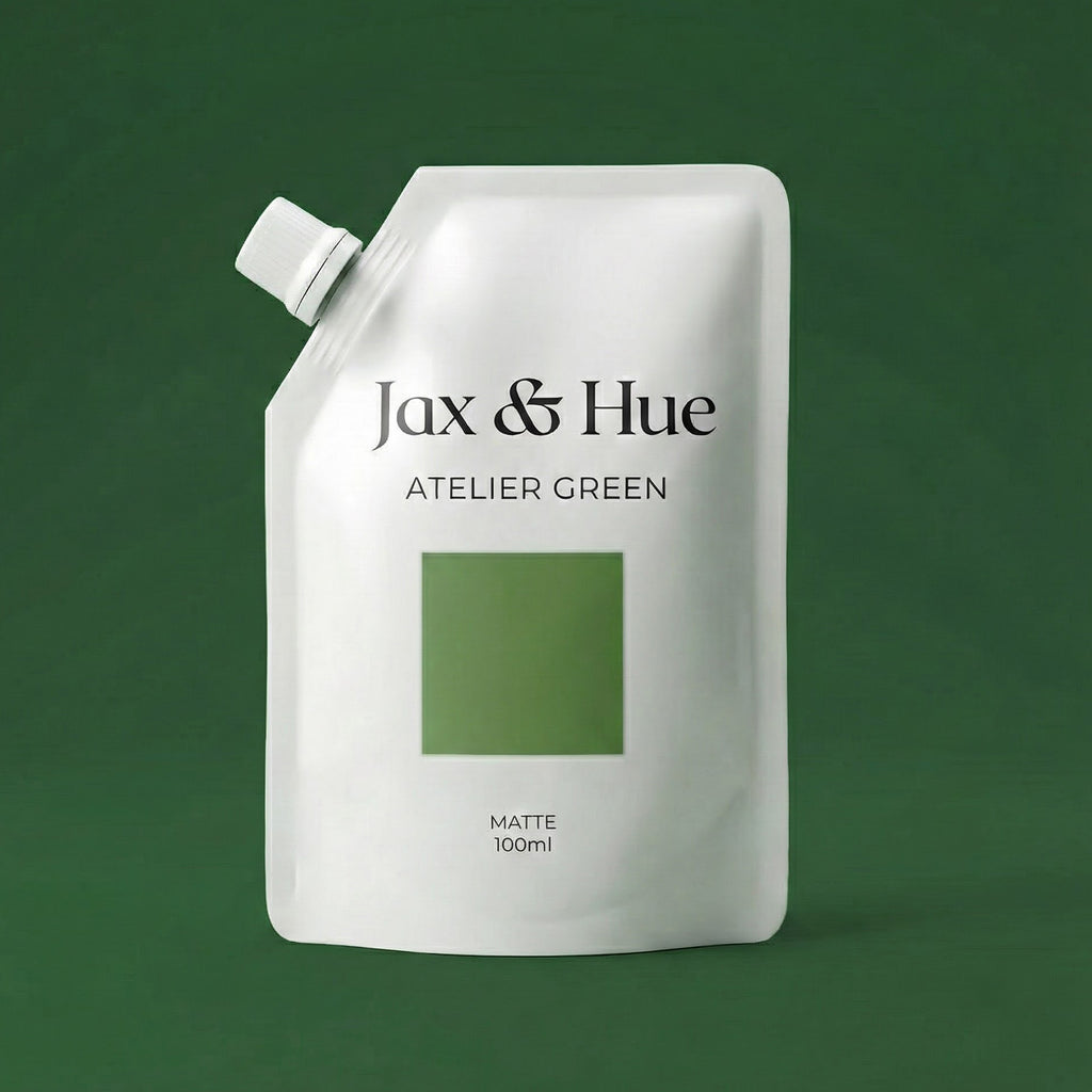 Jax & Hue Atelier Green packaging on a green background