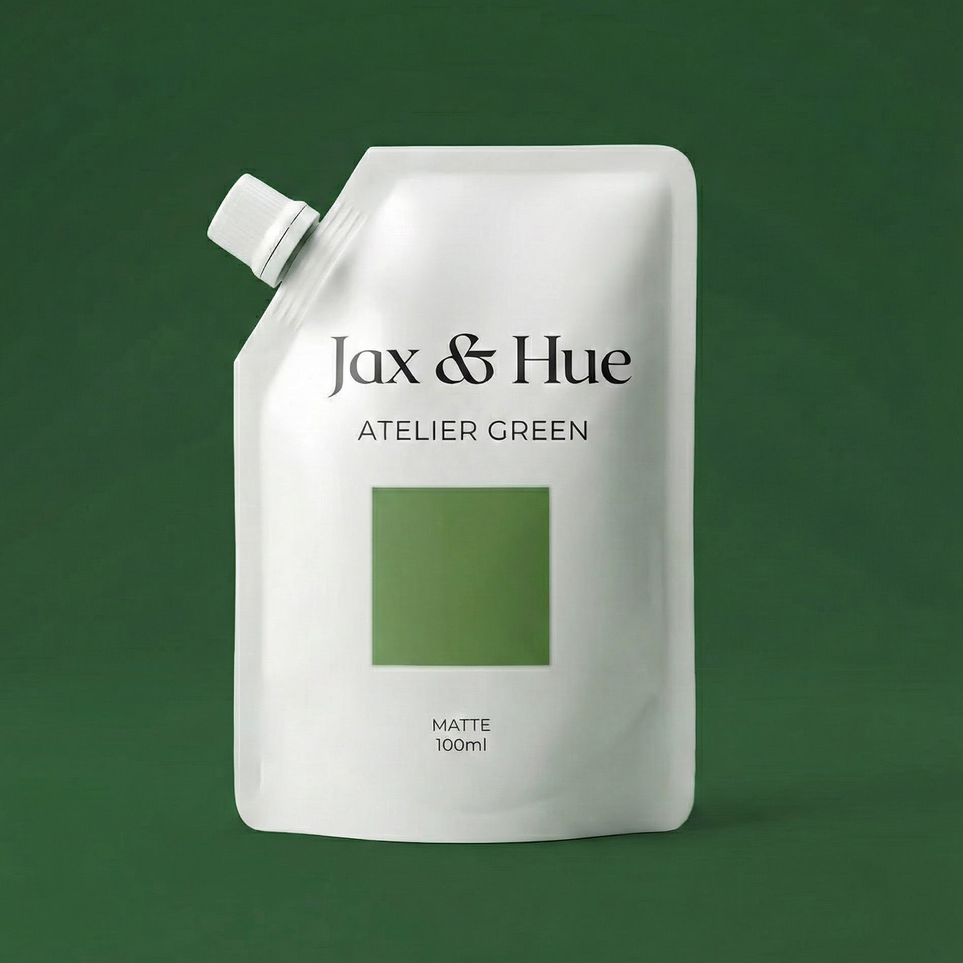 Jax & Hue Atelier Green packaging on a green background