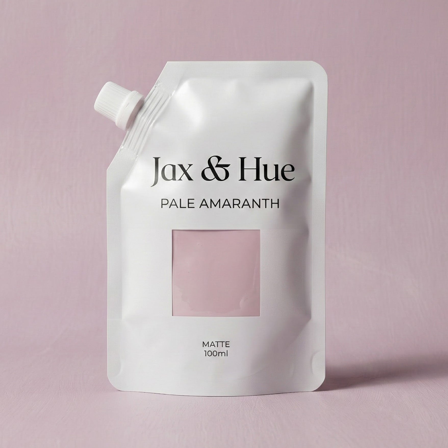 Jax & Hue hair dye pouch with 'Pale Amaranth' color on a pink background