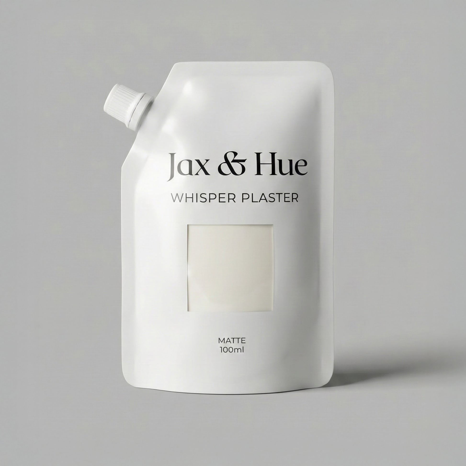Jax & Hue Whisper Plaster container on a gray background