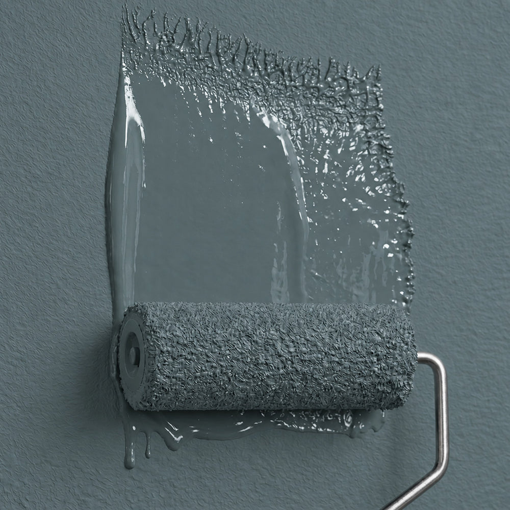 Salt Fjord blue-green grey paint on a roller and freshly painted surface, showing wet paint texture and sheen.
