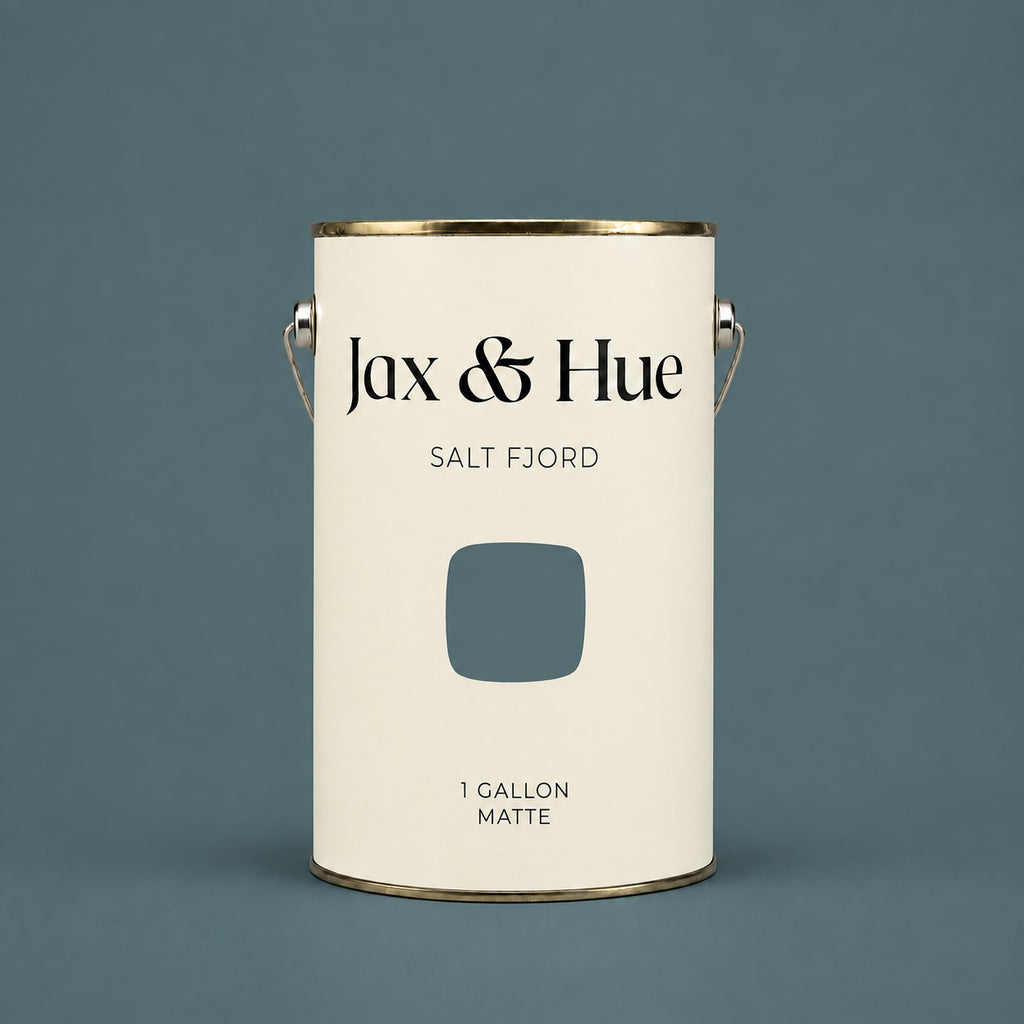 Jax & Hue Salt Fjord one-gallon matte interior paint can against a matching blue-green grey background.
