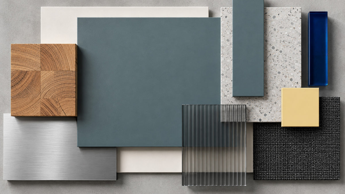 Salt Fjord blue-green grey paint paired with oak, terrazzo, ribbed glass, brushed aluminum, and yellow accents.