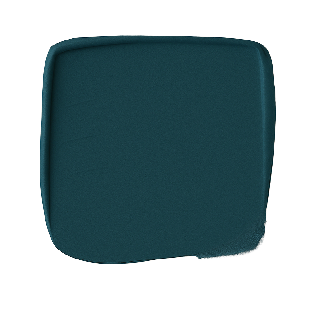 Teal cushion on a white background